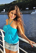Ukrainian mail order bride Yuliia from Kyiv with light brown hair and blue eye color - image 3