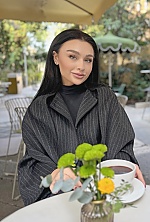 Ukrainian mail order bride Vera from Kyiv with black hair and green eye color - image 8