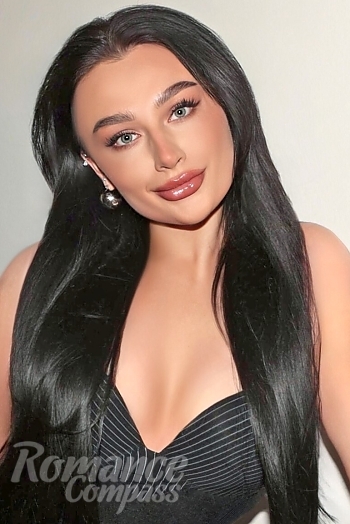 Ukrainian mail order bride Vera from Kyiv with black hair and green eye color - image 1