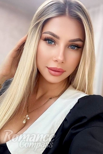 Ukrainian mail order bride Elena from Paris with blonde hair and blue eye color - image 1