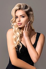 Ukrainian mail order bride Anastasia from Kyiv with blonde hair and blue eye color - image 3