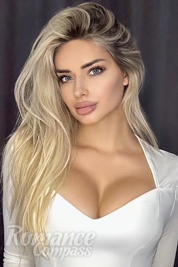 Ukrainian mail order bride Anastasia from Kyiv with blonde hair and blue eye color - image 1