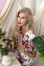 Ukrainian mail order bride Nina from Temirtau with blonde hair and green eye color - image 9