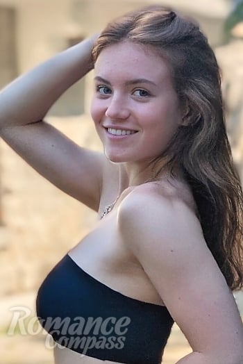 Ukrainian mail order bride Yulia from Ivano-Frankivsk with light brown hair and blue eye color - image 1