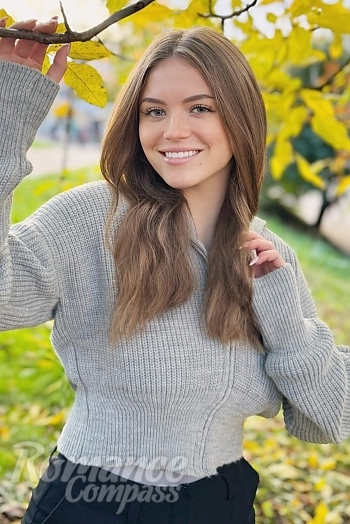 Ukrainian mail order bride Yulia from Ivano-Frankivsk with light brown hair and blue eye color - image 1