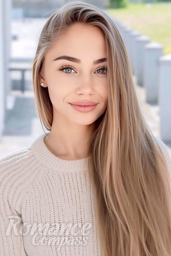 Ukrainian mail order bride Olha from Kyiv with blonde hair and blue eye color - image 1