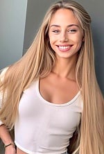 Ukrainian mail order bride Olha from Kyiv with blonde hair and blue eye color - image 6