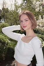 Ukrainian mail order bride Bogdana from Cherkasy with light brown hair and blue eye color - image 9