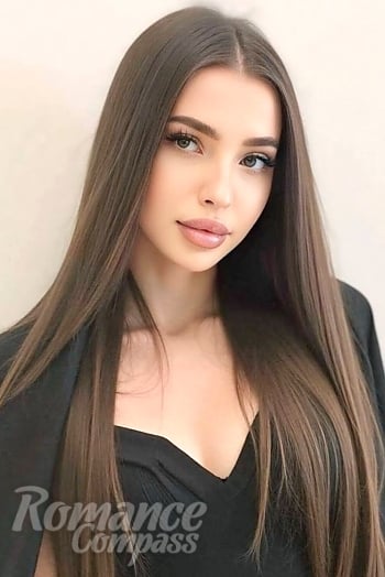 Ukrainian mail order bride Olha from Kyiv with brunette hair and green eye color - image 1