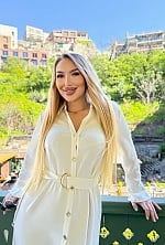 Ukrainian mail order bride Anna from Kyiv with blonde hair and green eye color - image 8