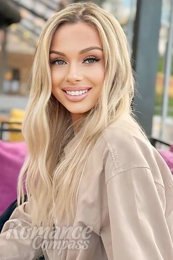 Ukrainian mail order bride Olga from Zhytomyr with blonde hair and green eye color - image 1