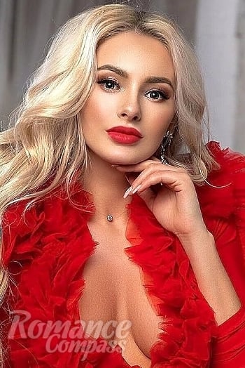 Ukrainian mail order bride Oleksandra from Warsaw with blonde hair and black eye color - image 1