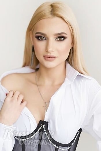 Ukrainian mail order bride Ekaterina from Kyiv with blonde hair and hazel eye color - image 1