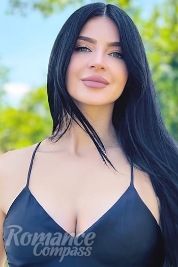 Ukrainian mail order bride Yana from Kyiv with black hair and grey eye color - image 1