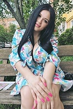 Ukrainian mail order bride Valeriia from Chernihiv with black hair and green eye color - image 9