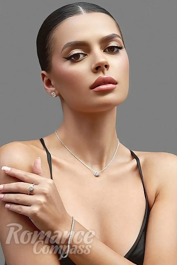 Ukrainian mail order bride Angelina from Marbella with light brown hair and brown eye color - image 1
