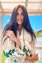 Ukrainian mail order bride Anastasia from Kyiv with brunette hair and blue eye color - image 2