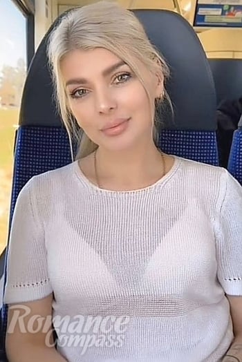 Ukrainian mail order bride Lyudmila from Lutsk with blonde hair and blue eye color - image 1