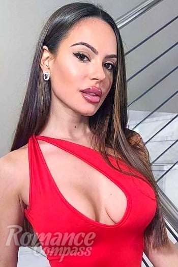 Ukrainian mail order bride Carolina from Madrid with brunette hair and hazel eye color - image 1