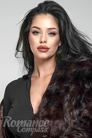 Ukrainian mail order bride Maryna from Kyiv with black hair and blue eye color - image 1