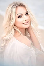 Ukrainian mail order bride Iryna from Kyiv with blonde hair and blue eye color - image 4