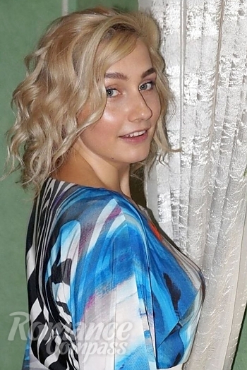 Ukrainian mail order bride Natalya from Lubny with blonde hair and blue eye color - image 1