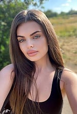 Ukrainian mail order bride Maria from Constanța with light brown hair and blue eye color - image 4