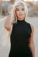 Ukrainian mail order bride Victoria from Turin with blonde hair and blue eye color - image 3