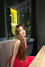 Ukrainian mail order bride Vladilena from Kyiv with light brown hair and green eye color - image 13