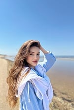 Ukrainian mail order bride Vladilena from Kyiv with light brown hair and green eye color - image 7