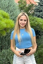 Ukrainian mail order bride Anastasiia from Lviv with blonde hair and brown eye color - image 9