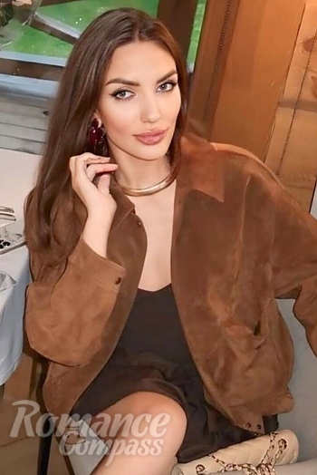 Ukrainian mail order bride Ksenija from Riga with light brown hair and brown eye color - image 1