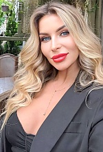 Ukrainian mail order bride Tetiana from Kyiv with blonde hair and green eye color - image 8