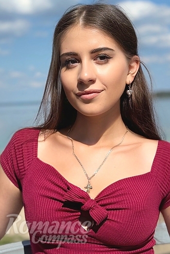 Ukrainian mail order bride Nataliia from Kyiv with black hair and green eye color - image 1