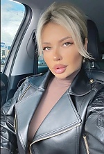 Ukrainian mail order bride Olena from Kyiv with blonde hair and brown eye color - image 9