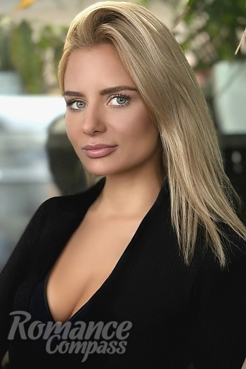 Ukrainian mail order bride Lyudmila from Kyiv with blonde hair and green eye color - image 1