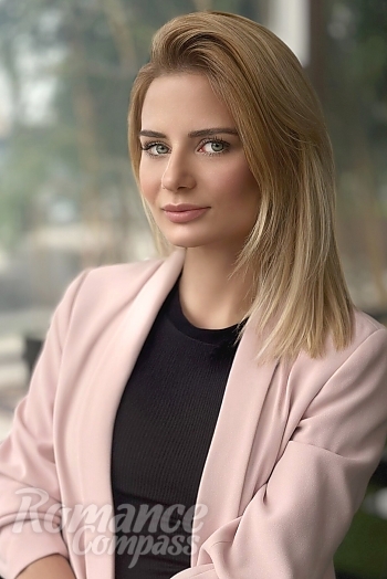 Ukrainian mail order bride Lyudmila from Kyiv with blonde hair and green eye color - image 1