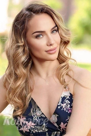 Ukrainian mail order bride Eva from Kyiv with light brown hair and green eye color - image 1