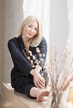 Ukrainian mail order bride Nadezhda from Kyiv with blonde hair and blue eye color - image 8