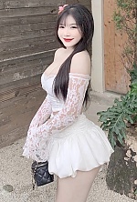 Ukrainian mail order bride Nguyen from Hanoi with auburn hair and brown eye color - image 9