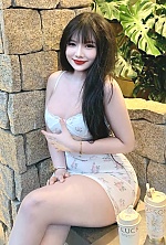 Ukrainian mail order bride Nguyen from Hanoi with auburn hair and brown eye color - image 10
