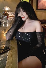 Ukrainian mail order bride Nguyen from Hanoi with auburn hair and brown eye color - image 11