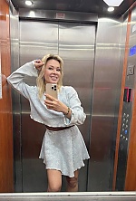 Ukrainian mail order bride Olena from Kyiv with blonde hair and blue eye color - image 7