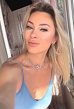 Ukrainian mail order bride Olena from Kyiv with blonde hair and blue eye color - image 6