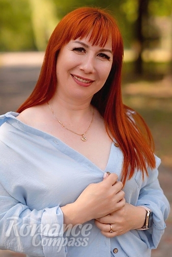 Ukrainian mail order bride Viktoriia from Kryvyi Rih with red hair and brown eye color - image 1
