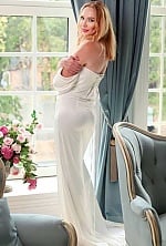 Ukrainian mail order bride Elena from Kyiv with red hair and green eye color - image 11