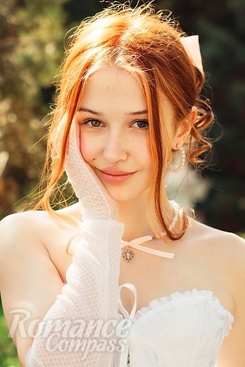 Ukrainian mail order bride Christina from Ivano-Frankivsk with red hair and green eye color - image 1