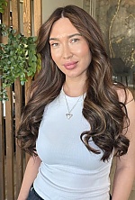 Ukrainian mail order bride Yevheniia from Kyiv with light brown hair and green eye color - image 11