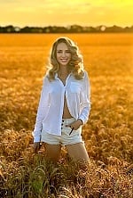 Ukrainian mail order bride Oksana from Kyiv with light brown hair and grey eye color - image 9