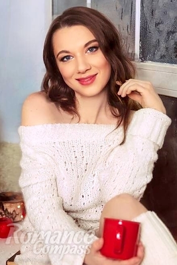 Ukrainian mail order bride Tetiana from Odesa with light brown hair and blue eye color - image 1